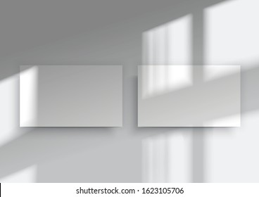 Two white business cards. Mockup of Overlay shadow from the window. Natural shade from above. Realistic vector illustration. An abstract scene with a white background in a minimalist style.