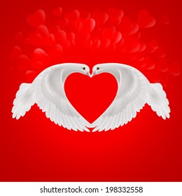 Two white doves make the shape of the wings of the red heart