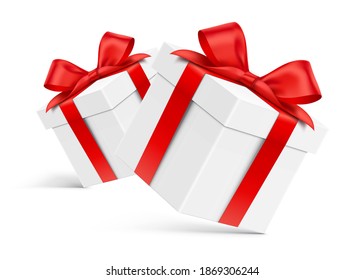 Two white gift boxes, for holiday design decoration. Realistic vector gift boxes, with red satin ribbons, isolated on the white background.