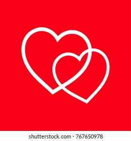 two white hearts on a red background. a symbol of love. Valentine's day