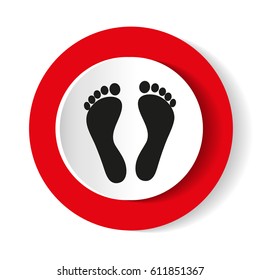 Two white human footprints, isolated on red
