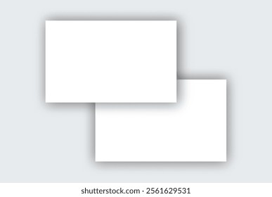 Two white paper rectangles with soft shadows on a light gray background - blank template.