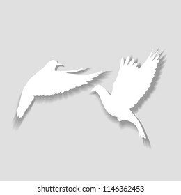 Two white pigeons take off, a symbol of love and happiness.