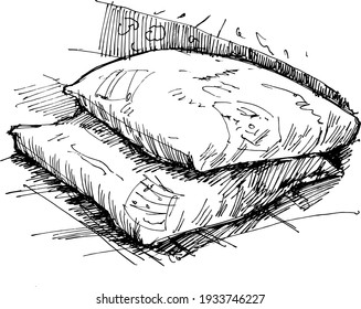 Two white pillows lying on top of each other