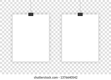 Two white realistic sheets hang on paper clips on a transparent background.