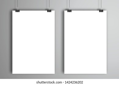 Two white sheets of paper hang on clips. Mockup template with shadow