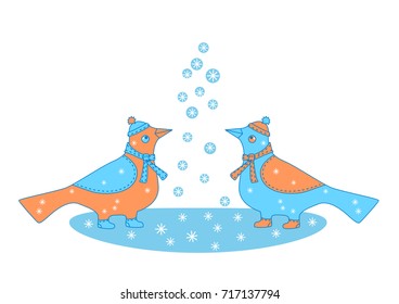 two winter birds look at snowflakes