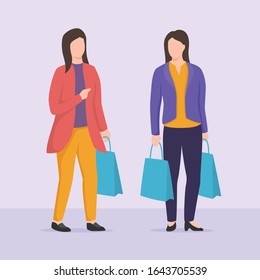 two woman shopping discussion with shopping bag with casual clothes
