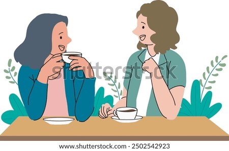 Two women are chatting casually in a cafe