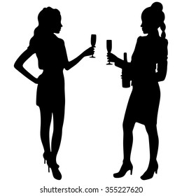 Two women drinking champagne