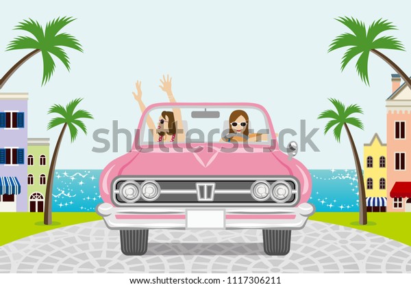 Two women driving a Pink convertible in summer\
nature - seaside town