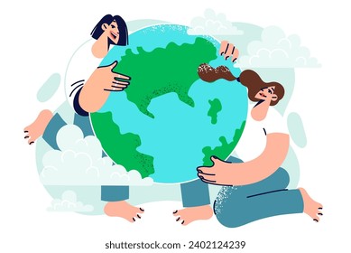 Two women eco activists hug giant globe calling to celebrate planet earth day and help preserve ecological balance. Girls eco volunteers take care of environment, demonstrating own civic position.