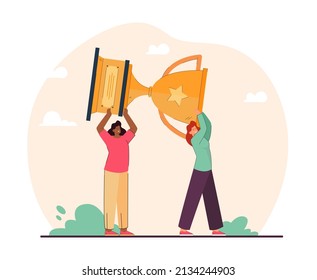 Two women holding huge gold cup together. Friends or colleagues carrying big trophy flat vector illustration. Success, teamwork, achievement concept for banner, website design or landing web page
