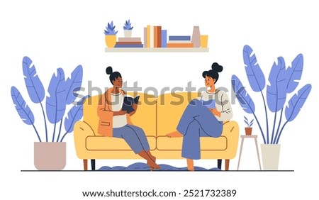 Two women reading on yellow sofa indoor plants bookshelves
