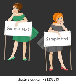 Two women with signs