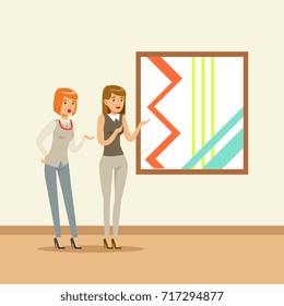 Two women standing in modern art gallery in front of colorful painting, people attending museum