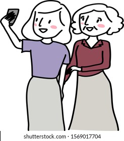 Two women taking selfie with smartphone. Cheerful mother and daughter taking selfie together. Cute woman holding phone and taking selfie with her mom. Happy women using phone taking selfie.