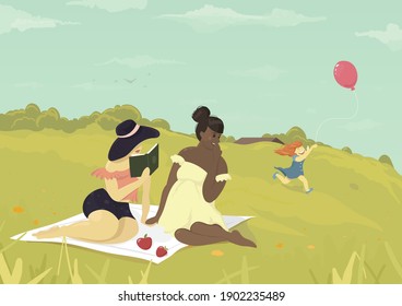 two women with their daughter in nature