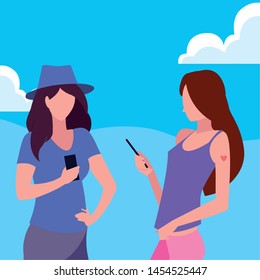 two women using smartphone talking