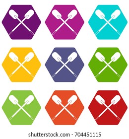 Two wooden crossed oars icon set many color hexahedron isolated on white vector illustration