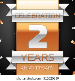 Two years anniversary celebration golden and silver background. Anniversary ribbon