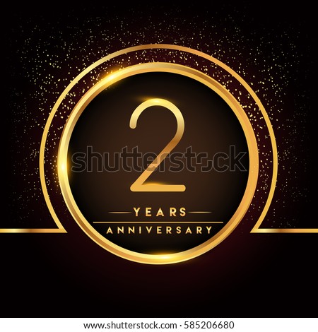 two years birthday celebration logotype. 2nd anniversary logo with confetti and golden ring isolated on black background, vector design for greeting card and invitation card.