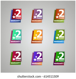 Two years warranty multiple colors icon set vector illustration isolated on gray background. Stars and gradient with shadow. 