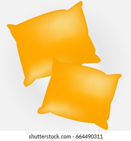 Two yellow empty and soft pillows. Template for your design.