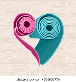 Two yoga mats stacked in the shape of heart on the wood floor. Pink and blue colors. Vector illustration