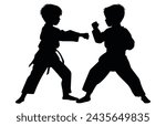 Two young boys doing karate silhouette, Two karate young boys fighters in a match,  