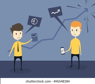 Two young businessmen at work 
