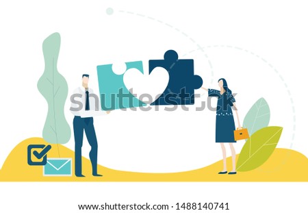 Two young people working with puzzle pieces and finding love. Symbol of relationship, dating, collaborating, solving problems, thinking about creative idea