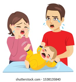 Two young tired parents desperate with baby ill crying