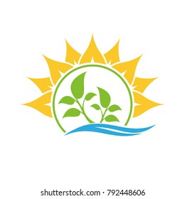 Two young trees and sun. Leaf logo. Leaf and sea icon. 