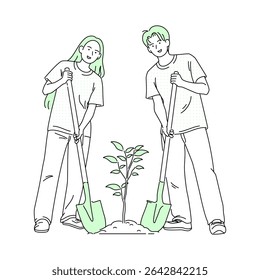Two Young Volunteers Plant Trees Together on World Environment Day, Planting Tree Seedlings with Shovels