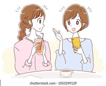 Two young women are having fun talking