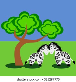 Two zebras standing under the tree