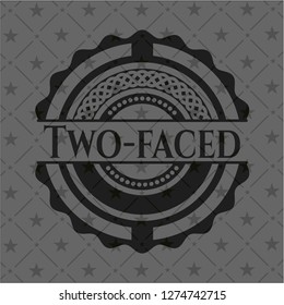 Two-faced dark emblem