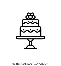Two-tiered cake with bow decoration on a pedestal isolated on dessert food
