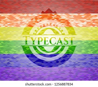 Typecast emblem on mosaic background with the colors of the LGBT flag