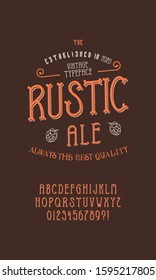 Typeface 'Rustic Ale'. Vector hand crafted font in oldschool style with hops. Good for posters, alcohol label and festival invitation.Letters and numbers.Vector illustration.