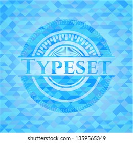 Typeset light blue mosaic emblem
