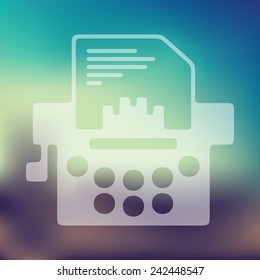 typewriter icon on blurred background