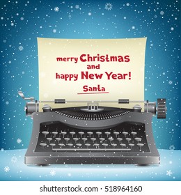 The typewriter on blue snow background and message from Santa Claus Merry Christmas and happy New Year