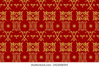 Typical Acehnese batik. Traditional art patterns from the province of Aceh, Indonesia, with a dark red background and gold ornaments