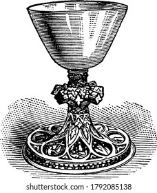 A typical representation of a large cup or goblet, the wine cup used in the Christian Eucharist, vintage line drawing or engraving illustration 