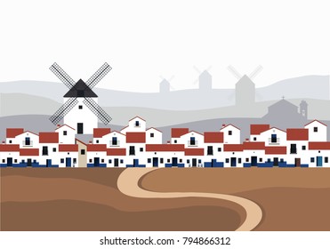 Typisches spanisches Dorf (La Mancha) mit Windmühlen im Hintergrund. Straße auf dem Boden im Vordergrund.