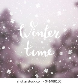 Typographic design "Winter Time" on a blurred abstract winter background with trees and snowflakes. EPS10 file. Gradient mesh and transparency effects used.