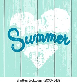 Typographic heart-shaped design on light blue wooden background.