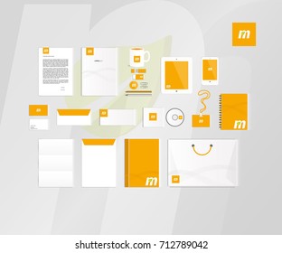 Typographic M logo. Corporate identity template set. Business stationery mock-up